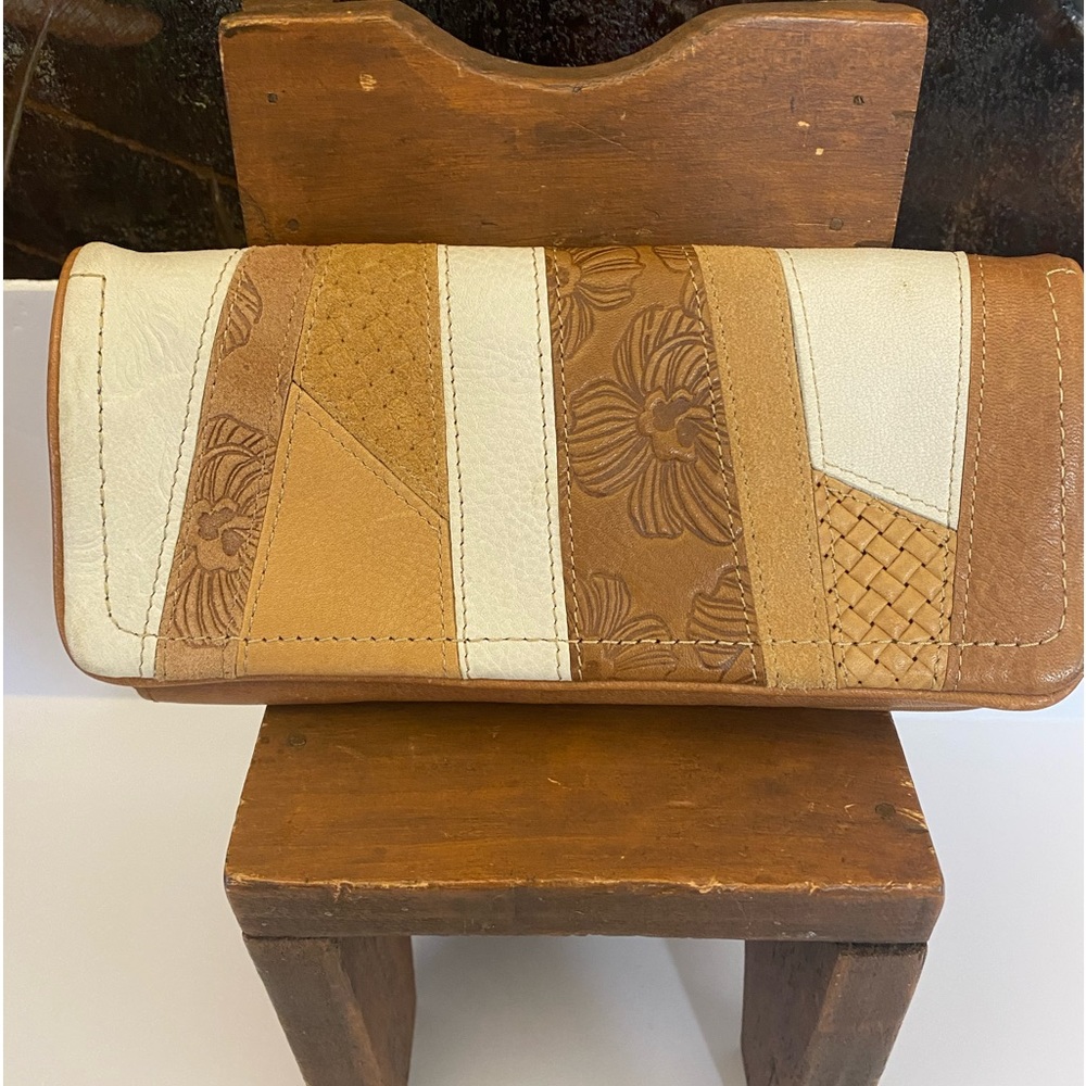 Fossil patchwork and tooled leather wallet